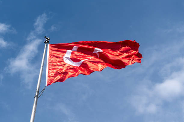 istock Waving Turkish flag cloudy blue sky in the background 1498992151
