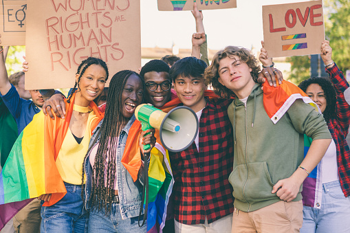 young students marching in favour of the lgbt community and people's rights