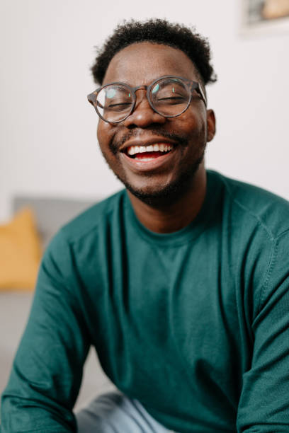 istock Young African American Man Embraces Happiness with a Beaming Smile 1498998464