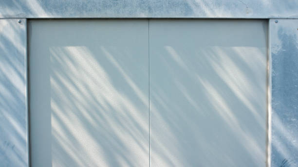 istock Foliage shadow in a shed wall 1499000994