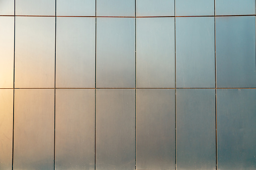 Facade Wall Metal Tiles of contemporary building. Construction archetecture texture