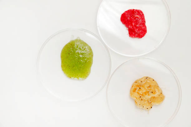 istock Three Petri Dishes with Color Cosmetics Scrub on white Background, Laboratory Test, flat lay. 1499002628