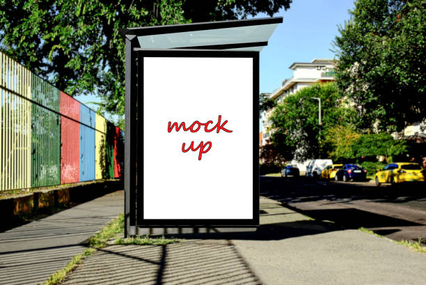 istock bus shelter with lightbox. blank white billboard ad panel at busstop. background for mockup 1499002988