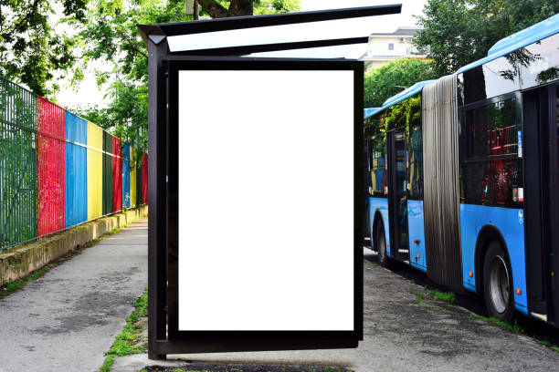 istock bus shelter lightbox. blank white billboard ad panel at busstop. background for mockup 1499004875
