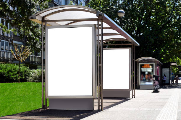 istock bus shelter with lightbox. blank white billboard ad panel at bus stop. background for mockup 1499005141