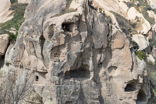 A picture of the rocky facades of the Goreme Historical National Park near the Goreme Open Air Museum.