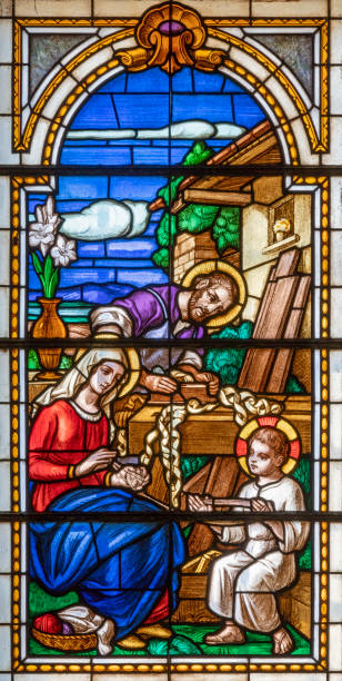 Alagna - The Holy Family in the stained glass of church  San Giovanni Battista Alagna - The Holy Family in the stained glass of end of 19. cent. roberto alagna stock pictures, royalty-free photos & images