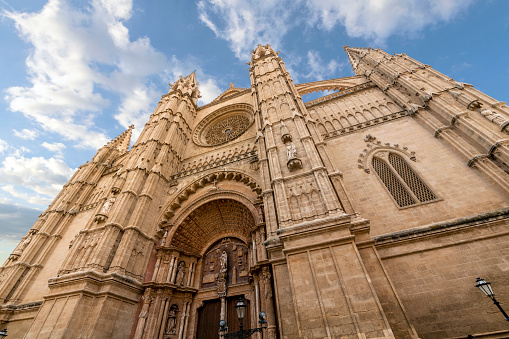 The imposing facade of the Cathedral Santa Maria in Palma de Majorca, Balearic islands, Spain.