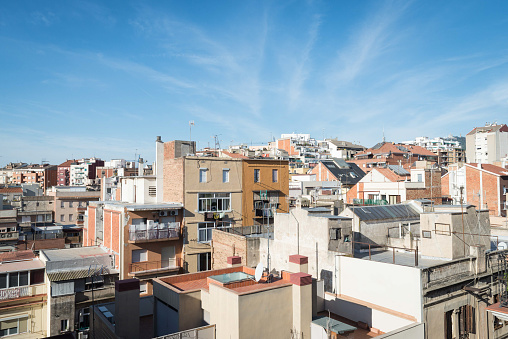 Barcelona, Spain - October 10th 2015: view over the colorful Gracia residential area that is built upon a hill.