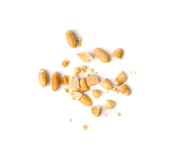 Crumbled Peanuts Isolated, Broken Roasted Arachis Nuts, Heap of Pea Nut Crumbs, Whole Groundnut Pieces