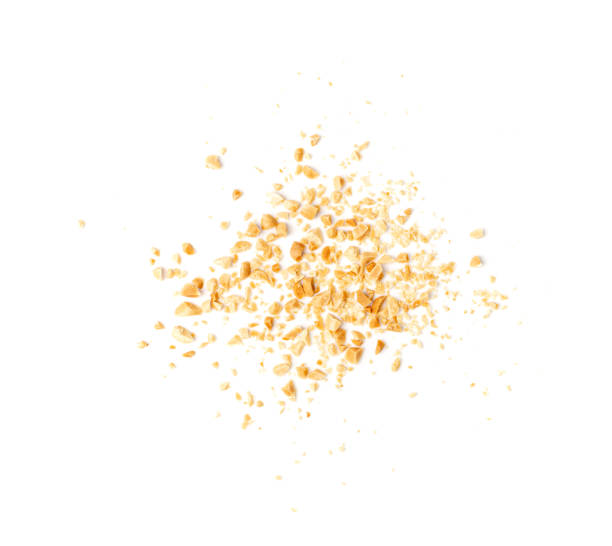 istock Crumbled Peanuts Isolated, Broken Roasted Arachis Nuts, Heap of Pea Nut Crumbs, Whole Groundnut Pieces 1499015444