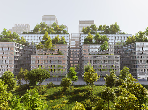 A sustainable green office or housing complex with roof gardens and park