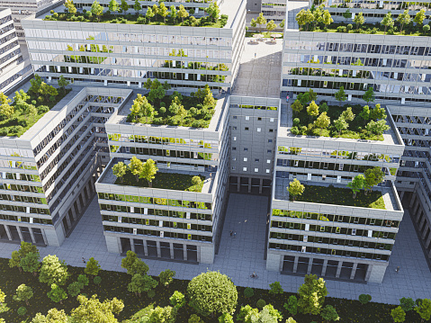 A sustainable green office or housing complex with roof gardens, high angle view