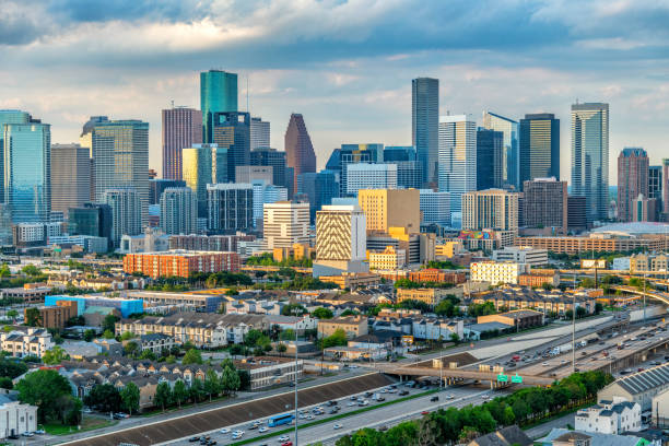downtown houston skyline at sunset - houston-texas bildbanksfoton och bilder