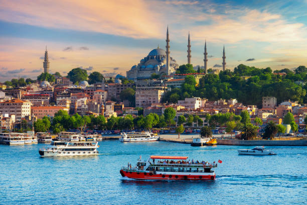 Touristic sightseeing ships in istanbul city, Turkey. stock photo