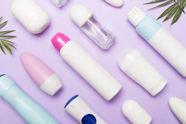 istock Many different deodorants on color background, top view 1499032885