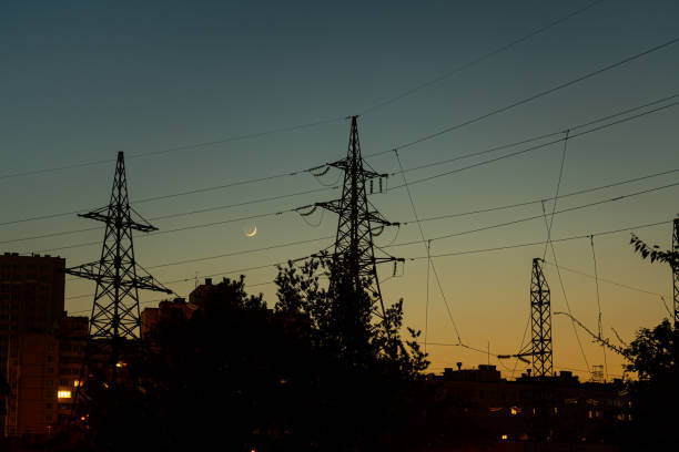 istock power lines at night at sunset against a beautiful warm sky 1499035533
