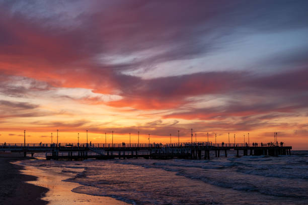istock Sunset at the seaside and view on the pier 1499038105