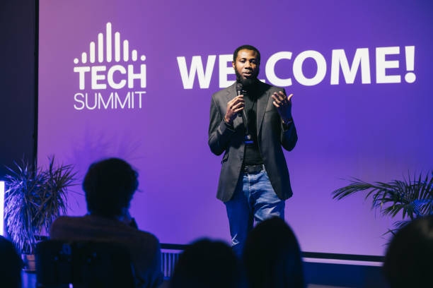 istock African entrepreneur making a presentation at business tech conference. 1499038782