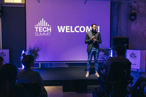 istock African entrepreneur making a presentation at business tech conference. 1499038784