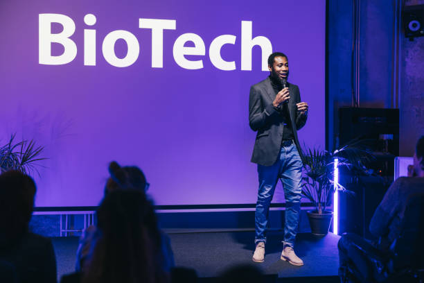istock African entrepreneur making a presentation at business tech conference. 1499038802