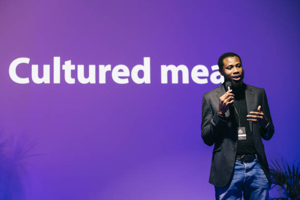 istock Entrepreneur talking about new product at Bio-tech conference 1499038807