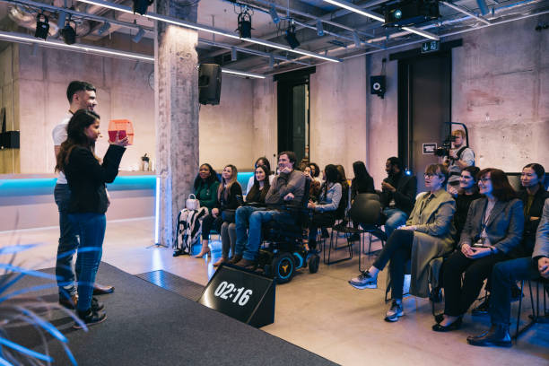 istock Tech start up owners giving a presentation at business conference. 1499038809