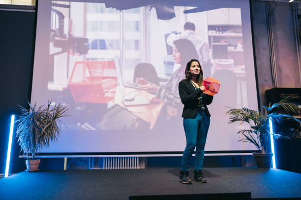 istock Indian businesswoman making a presentation at tech conference. 1499038810