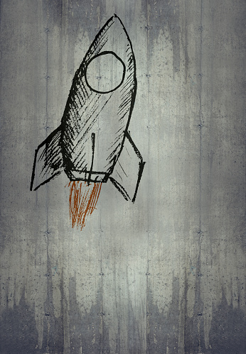 Rocket drawn on a concrete wall.