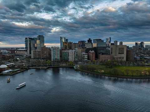 An aerial view of the West End, Boston, in the evening, overlooking Charles River and Lederman Park.