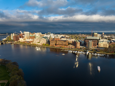 An aerial shot of the Charles River in Boston during the day.