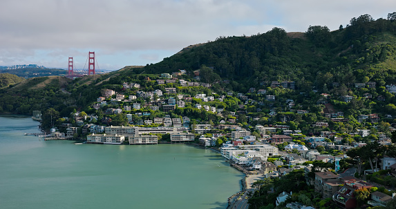 An aerial shot of Sausalito with the Golden Gate Bridge visible in the background.