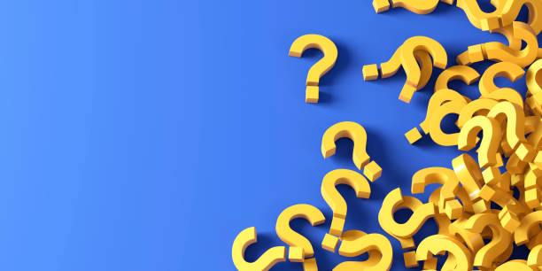 istock Lots of yellow question marks on blue background 1499066857