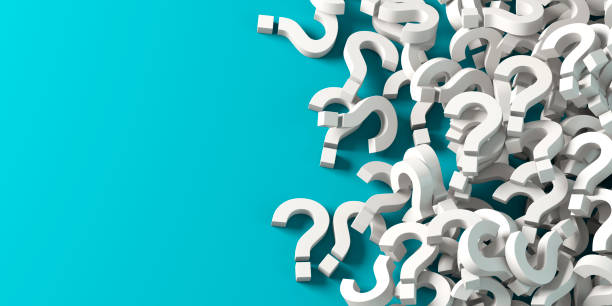 istock Lots of white question marks on blue background 1499067207