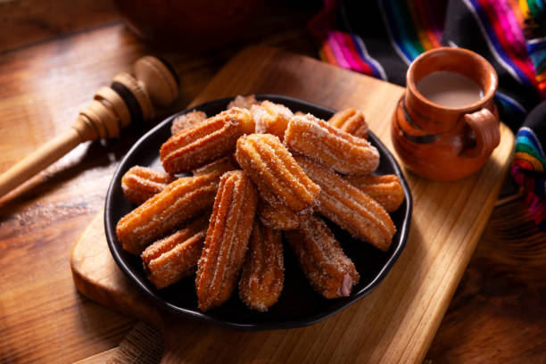 istock Churros and Hot Cocoa Milk Mexico 1499071068