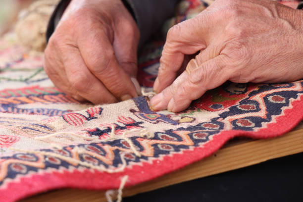 istock Old hand sewing carpet in istanbul 1499078571
