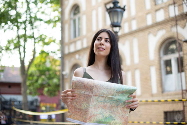 istock Young woman exploring the city 1499082847