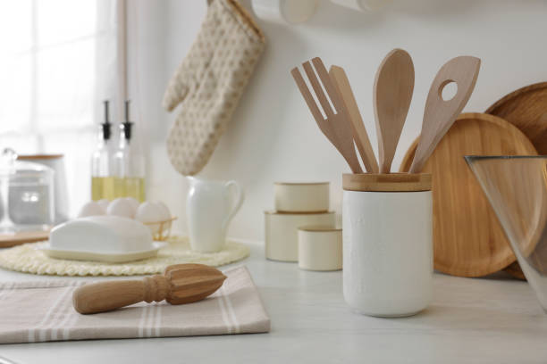 istock Set of different utensils and dishes on countertop in kitchen 1499090859