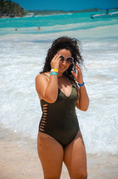 istock Young woman enjoying the beach 1499107400
