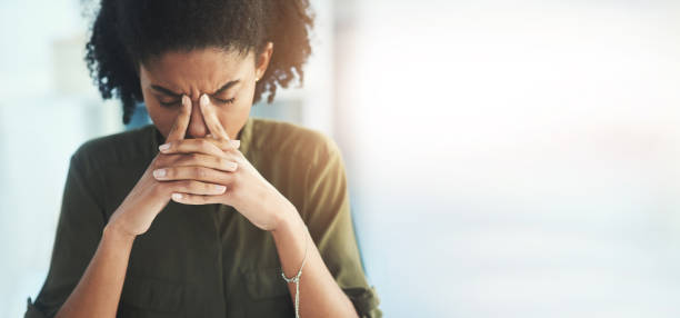 Mockup, business and black woman with stress, depression and mental health with burnout, overworked and deadline. Corporate, female employee and leader with headache, anxiety and schedule in office stock photo