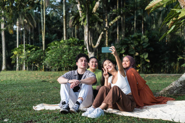 istock Friends take a selfie in the park. 1499112152