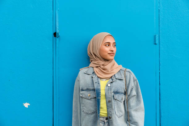 Confident Muslim woman in headscarf.