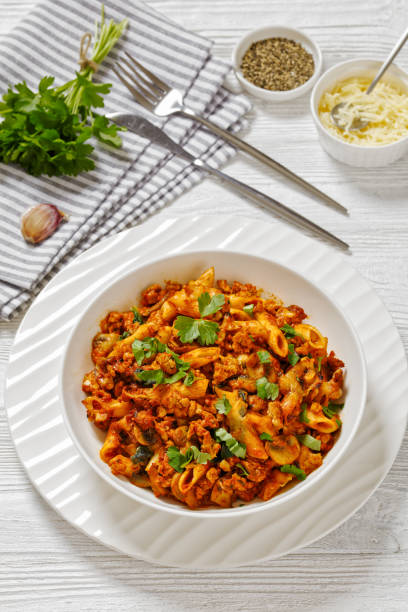 istock Ground Chicken Pasta Bake in white bowl, top view 1499114033