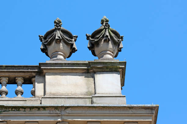 istock Sandstone carved urns on building roof 1499114707
