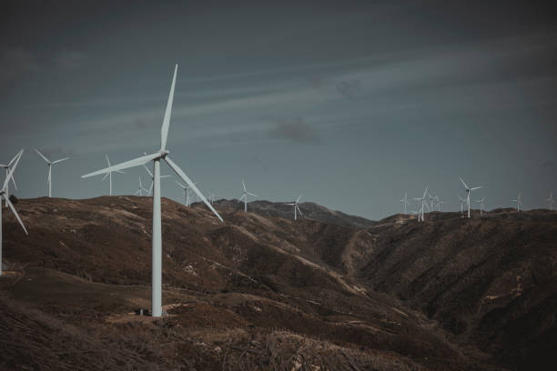 istock Wind turbine on a hill 1499116425