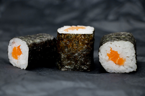 sushi with salmon on isolated background close up, restaurant food