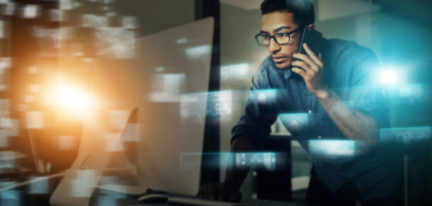 istock Hologram, computer data and businessman phone call reading digital data with future overlay. It, cyber security and trading software developer with technology talking about cryptocurrency strategy 1499122790
