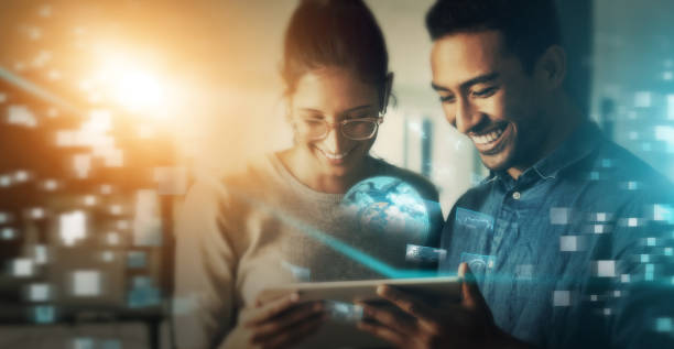istock Creative business people, tablet and future innovation for networking, planning or collaboration at night in double exposure. Team developing startup strategy or digital marketing on big data overlay 1499122793