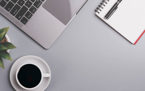 istock concept desk in morning ,freelance typing with laptop computer ,wireless communication ,online technology network connection with modern equipment ,searching for information on social media 1499127978