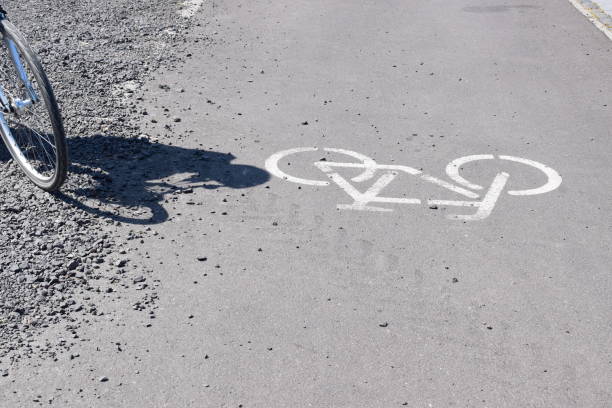 istock bike sign with biker shadow 1499135573